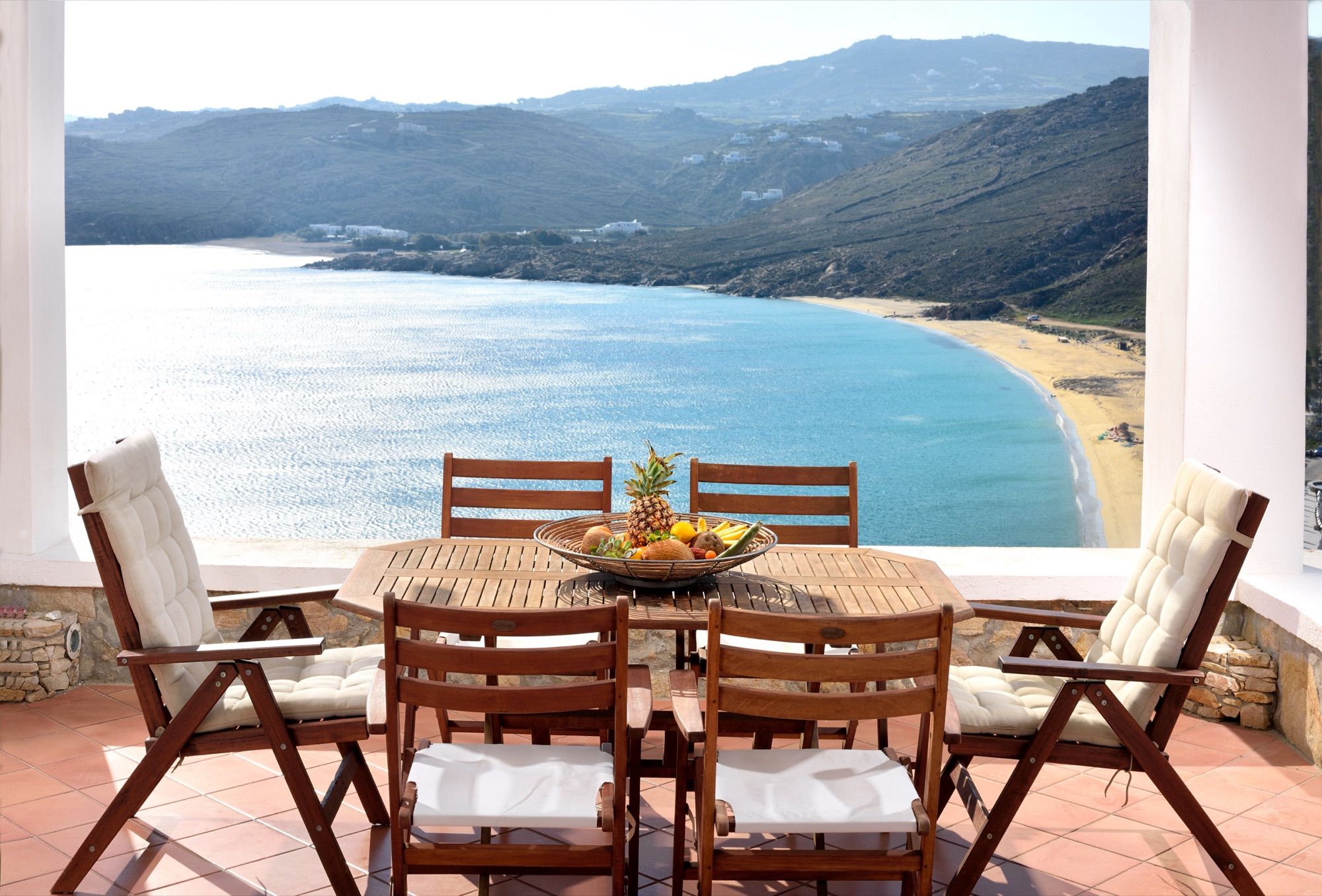 Terrace dining table looking out over Elia Beach